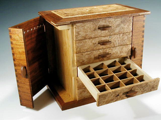 One of my most popular handcrafted jewelry boxes, the Swingdoor, shown with one drawer and door open.